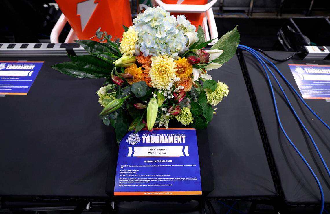 A seat on press row is set aside for John Feinstein at the 2025 ACC Men’s Tournament on Friday, March 14, 2025. Feinstein, best selling author and Washington Post columnist, died Thursday.