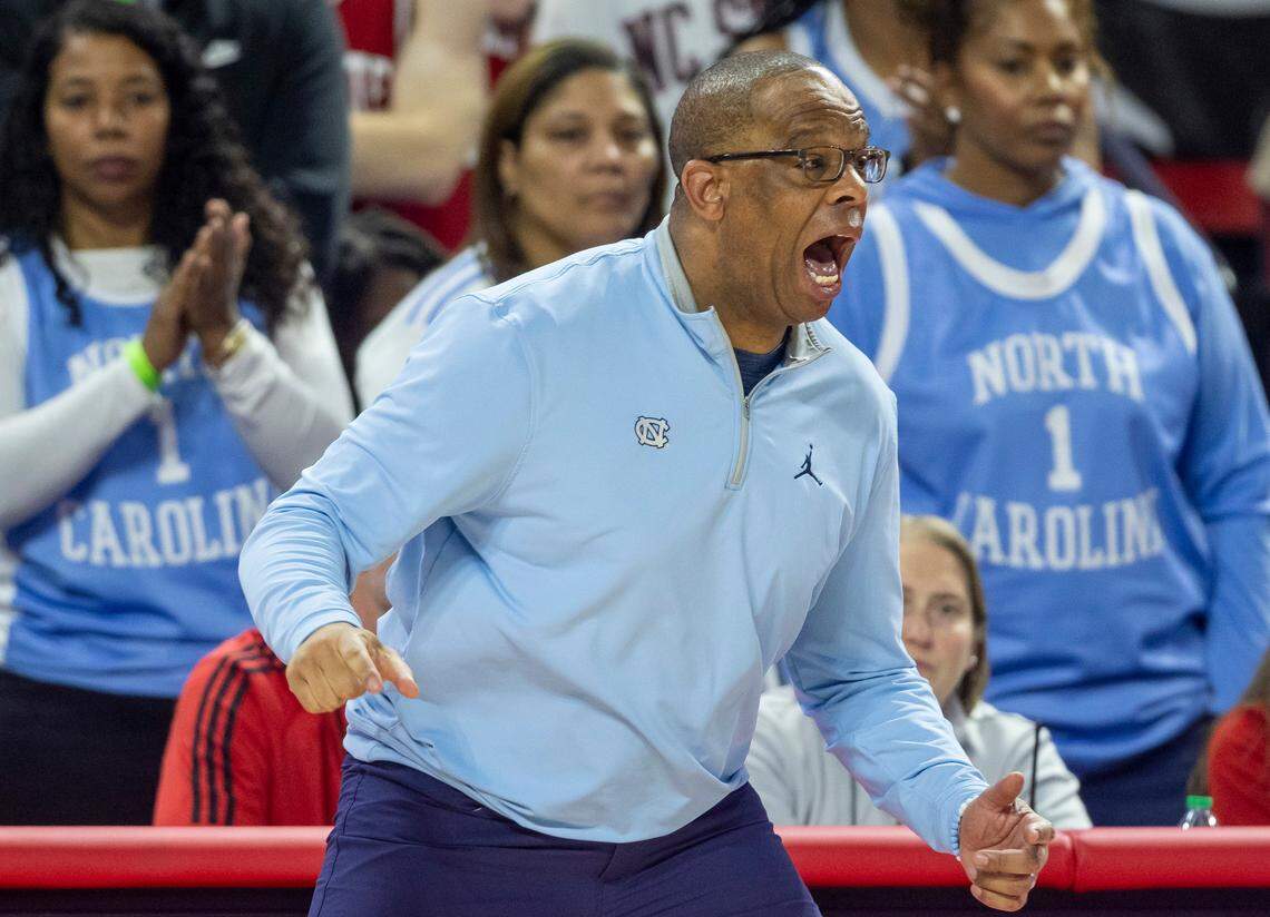 North Carolina coach Hubert Davis reacts to a foul against his team in the second half against N.C. State on Sunday, February 19, 2023 at PNC Arena in Raleigh, N.C.