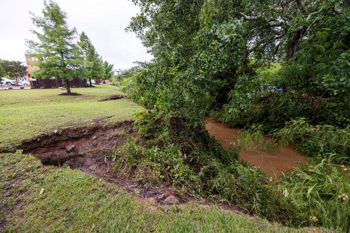 A section of bank was washed away on Little Buffalo Creek in downtown Sanford on Saturday, June 5, 2025. Flash flooding hit the city Thursday afternoon, blocking downtown streets, causing several car accidents and trapping residents in parts of town.