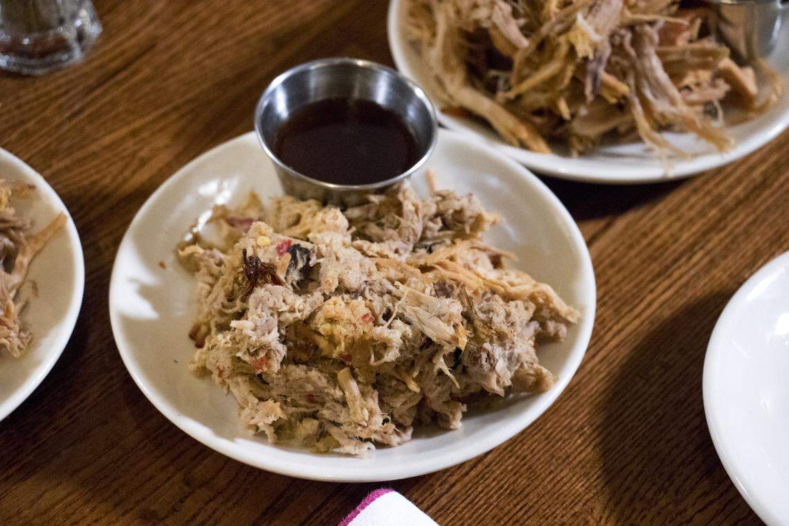 At the Pit in downtown Raleigh, "American Idol" winner Taylor Hicks gets a lesson in whole hog Eastern North Carolina barbecue and pulled pork Lexington style. Hicks hosts the food and travel show "State Plate" on the INSP network.  An episode featuring North Carolina food airs Monday, March 19, featuring The Pit Authentic Barbecue.