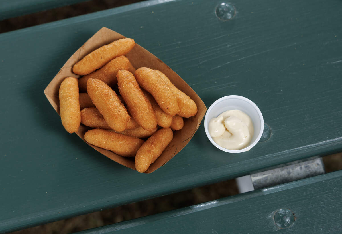 An order of hushpuppies with a side of maple butter is pictured at Jean’s By The Sea on Thursday, June 25, 2026, in Durham, N.C.