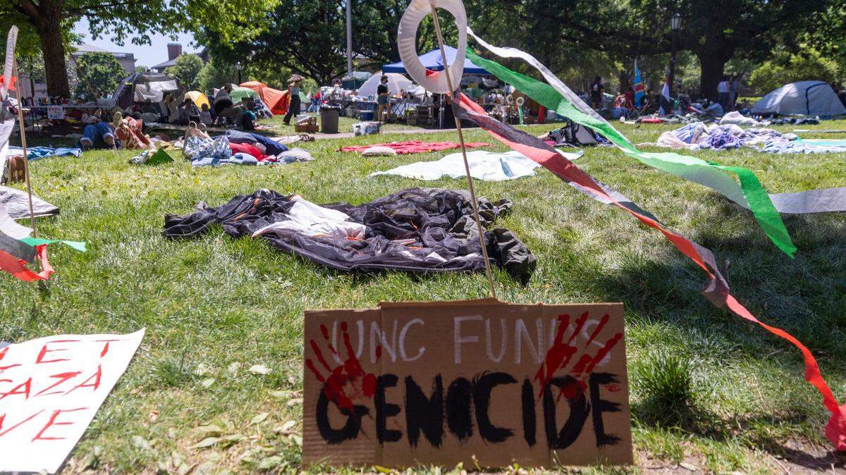 Demonstrators occupy an encampment during a pro-Palestinian protest at UNC-Chapel Hill on Monday, April 29, 2024.