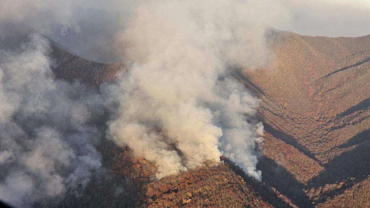 Smoke billows from the Collett Ridge Fire in the Nantahala National Forest, which has been burning since Oct. 23. Smoke from the hard-to-fight fire has affected air quality from the mountains to the coast.