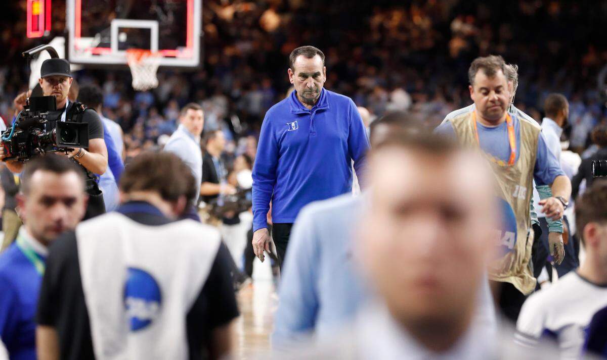 Duke head coach Mike Krzyzewski walks off the court after UNC’s 81-77 victory over Duke in the Final Four at Caesars Superdome in New Orleans, La., Saturday, April 2, 2022.