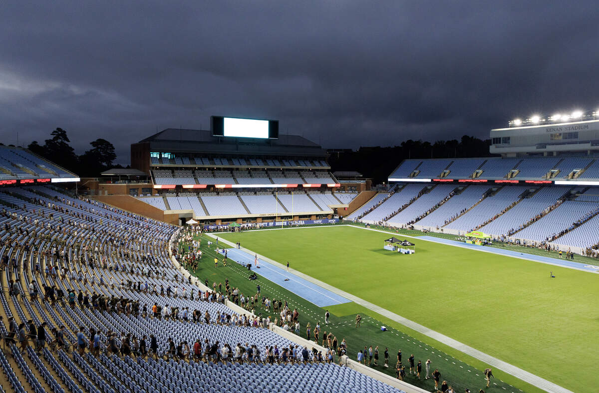 Participants climb the stairs of Kenan Memorial Stadium just before sunrise during an event in Chapel Hill, N.C. on Thursday, Sept. 11, 2025, to honor those who lost their lives during the attacks of Sept. 11, 2001.