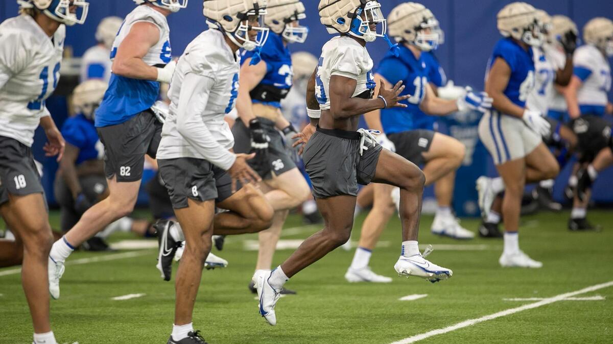 Duke wide receiver Sahmir Hagans (85) runs sprints with teammates during the Blue Devils’ spring practice on Friday, March 24, 2023 in Durham, N.C.