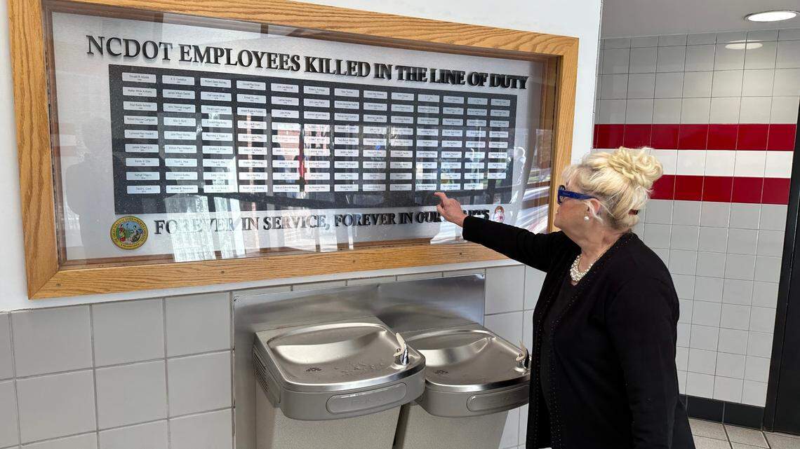 Kathy McGee Sledge points to the name of her grandfather, Mack Thomas Batchelor Jr., on one of the N.C. Department of Transportation memorials to workers who died on the job. The memorials are found in rest areas across the state.