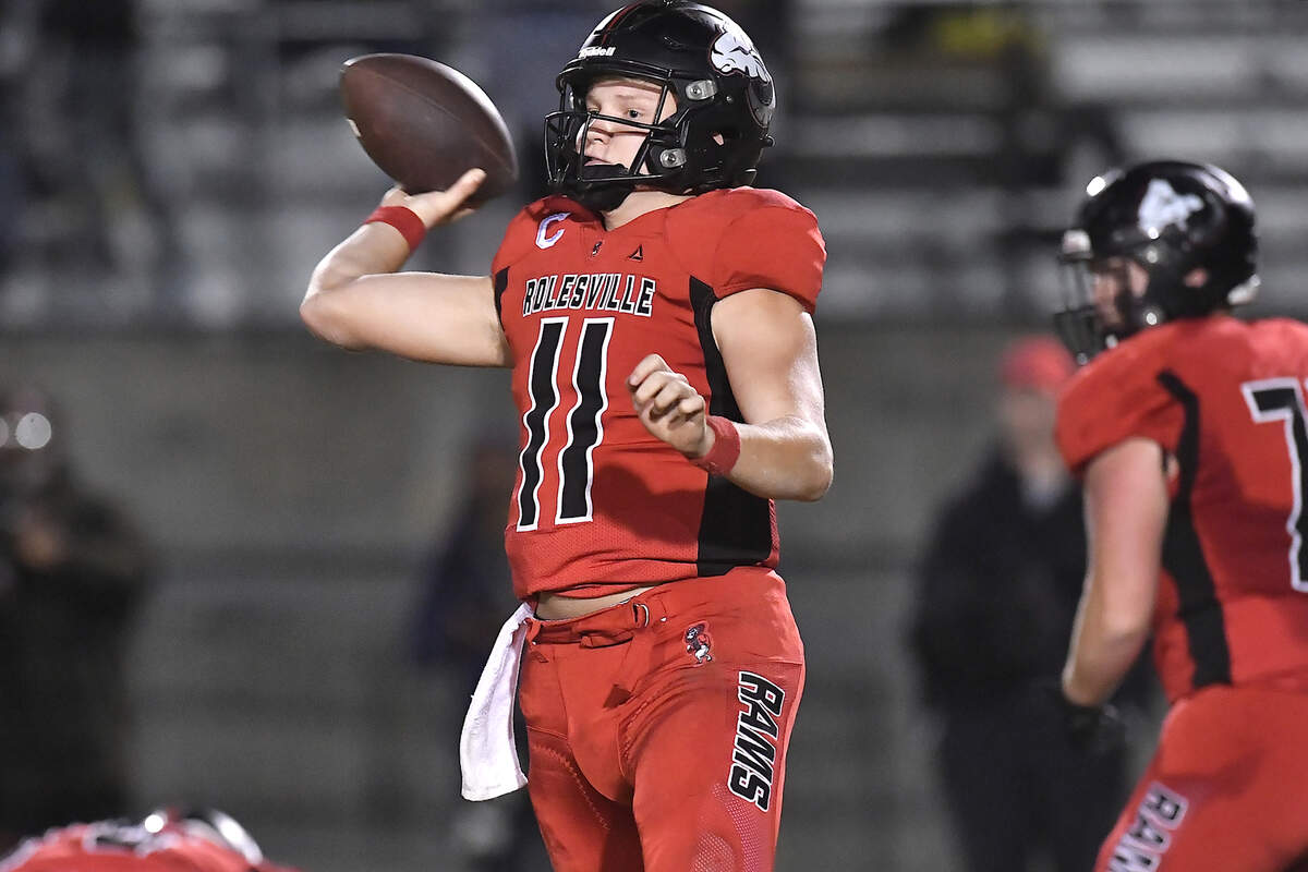 Rolesville quarterback Braden Atkinson (11) launches the pass against Millbrook during the first half. The Rolesville Rams and the Millbrook Wildcats met in a football game in Raleigh. N.C. on October 11, 2024.