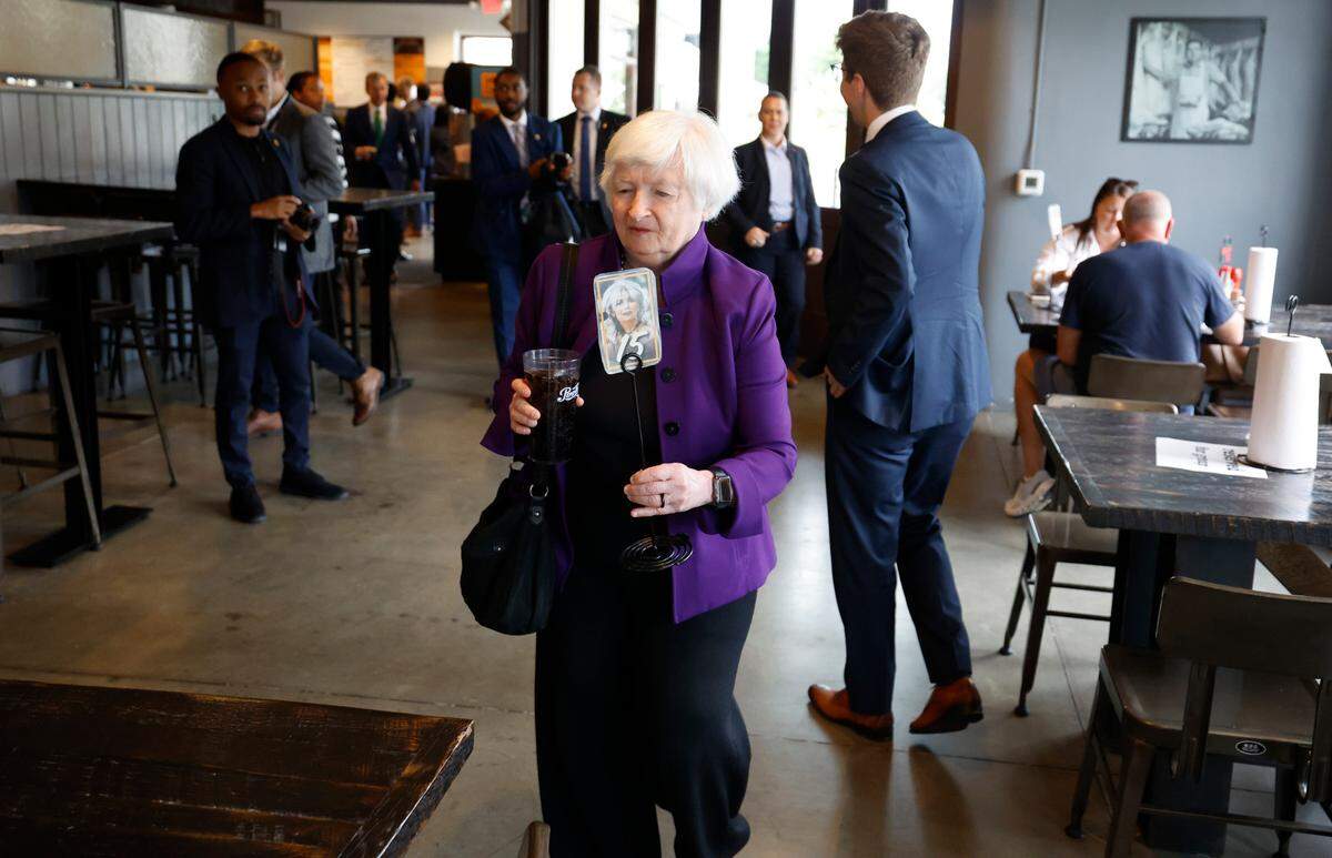U.S. Secretary of the Treasury Janet Yellen heads to her table after ordering lunch at Sam Jones BBQ in Raleigh Thursday, Sept. 5, 2024.