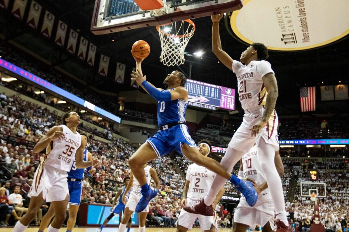 Duke forward Wendell Moore Jr. (0) gets past Florida State guard Cam’Ron Fletcher (21) for a shot in the first half of an NCAA college basketball game in Tallahassee, Fla., Tuesday Jan. 18, 2022. (AP Photo/Mark Wallheiser)