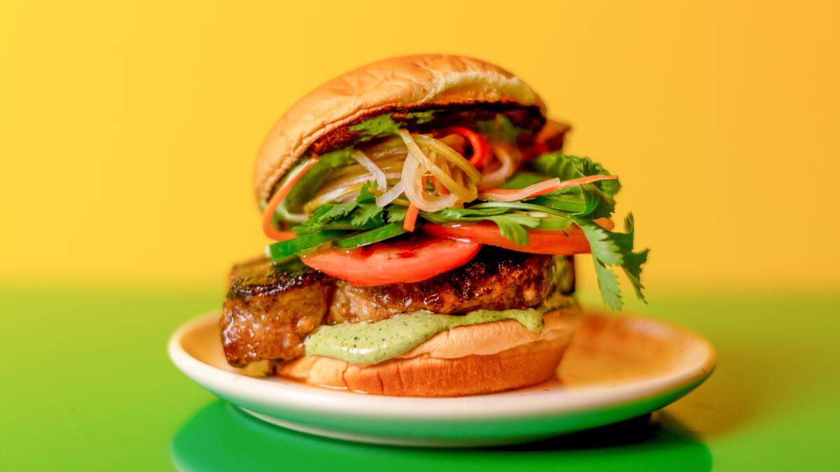 A pork chop sandwich will be on the menu at Queeny’s in Durham.