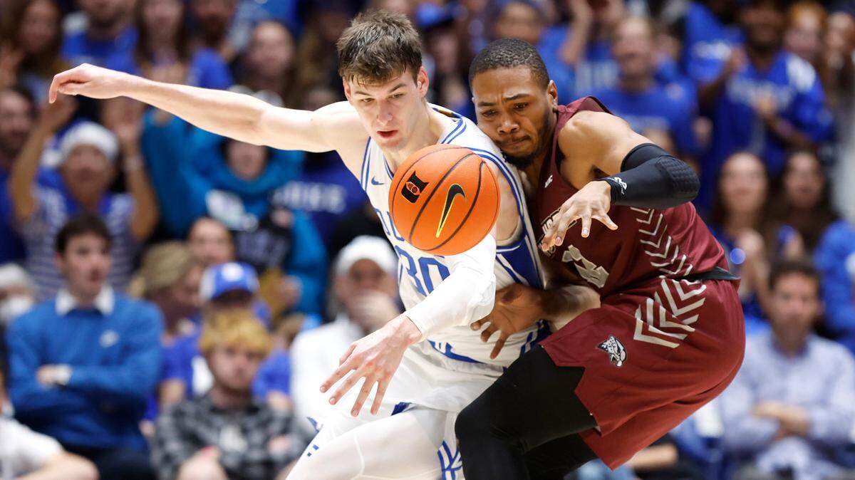 Duke’s Kyle Filipowski (30) steals the ball from Maryland-Eastern Shore’s Nathaniel Pollard Jr. (12) during the first half of Duke’s game against Maryland-Eastern Shore at Cameron Indoor Stadium in Durham, N.C., Saturday, Dec. 10, 2022.