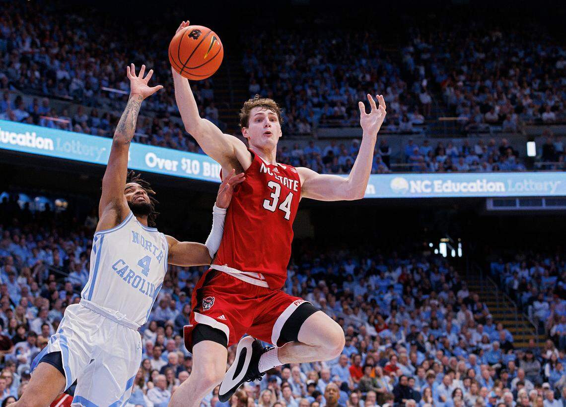 N.C. State’s Ben Middlebrooks tries to save a pass from going out of bounds during the second half of the Wolfpack’s 79-70 loss to North Carolina on Saturday, March 2, 2024, at the Smith Center in Chapel Hill, N.C.