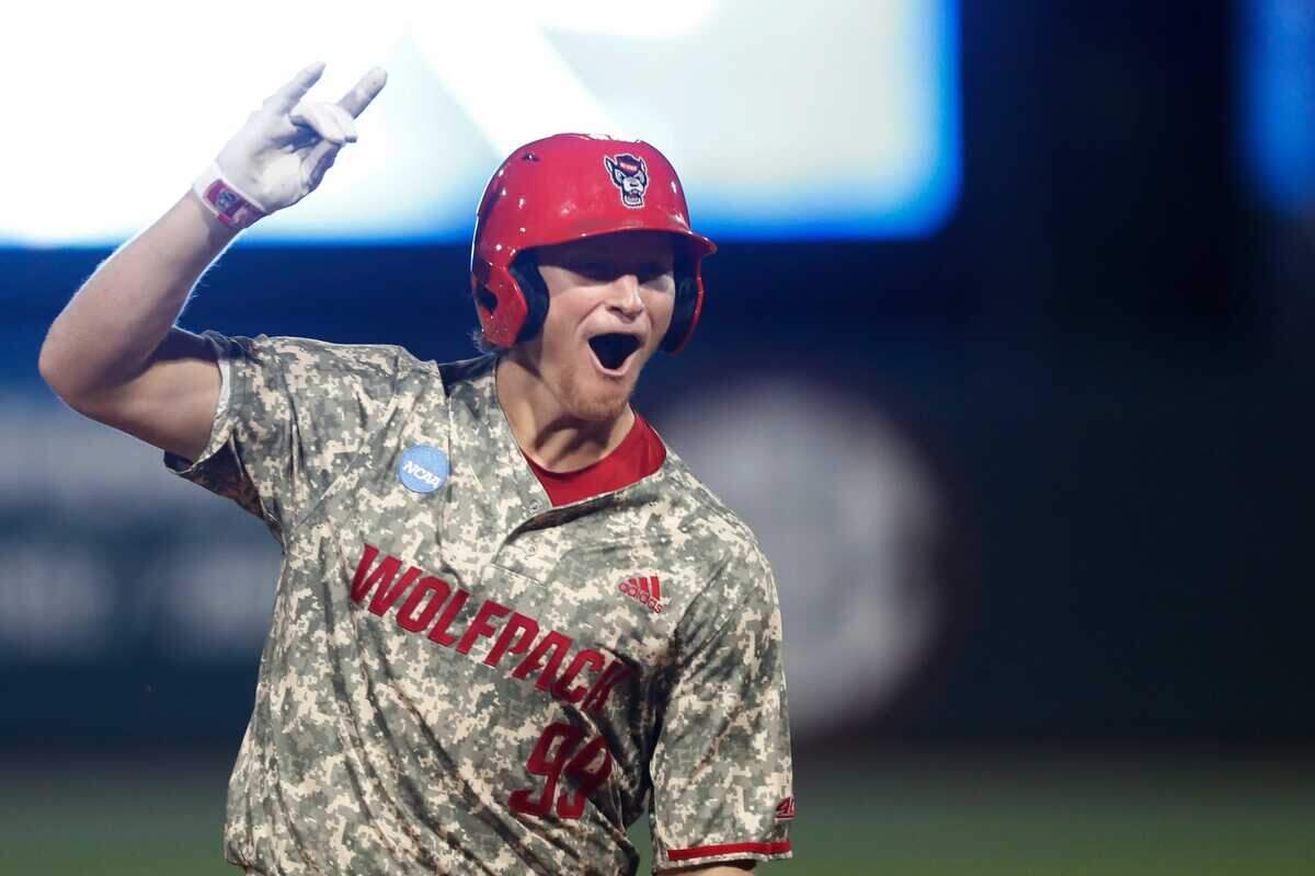 NC State’s Alec Makarewicz (99) celebrates after hitting a home run during Game 3 of the Super NCAA Regional against Georgia at Foley Field on Monday, June 10, 2024 in Athens, Ga. NC State won 8-5.