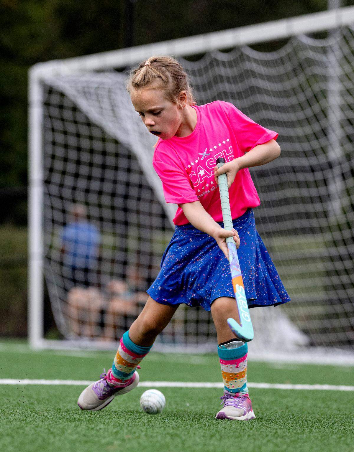 Michaela Miller, 7, practices during a fall academy event held by Carolina All Stars Field Hockey on Wednesday, Sept. 13, 2023, at Cedar Falls Park in Chapel Hill, N.C.