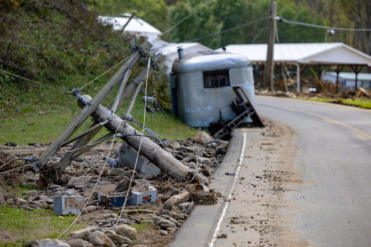 Fallen Utility lines in the Yancey County village of Pensacola, N.C. on Thursday, October 3, 2024. Hurricane Helene destroyed roads and knocked out power to the community.