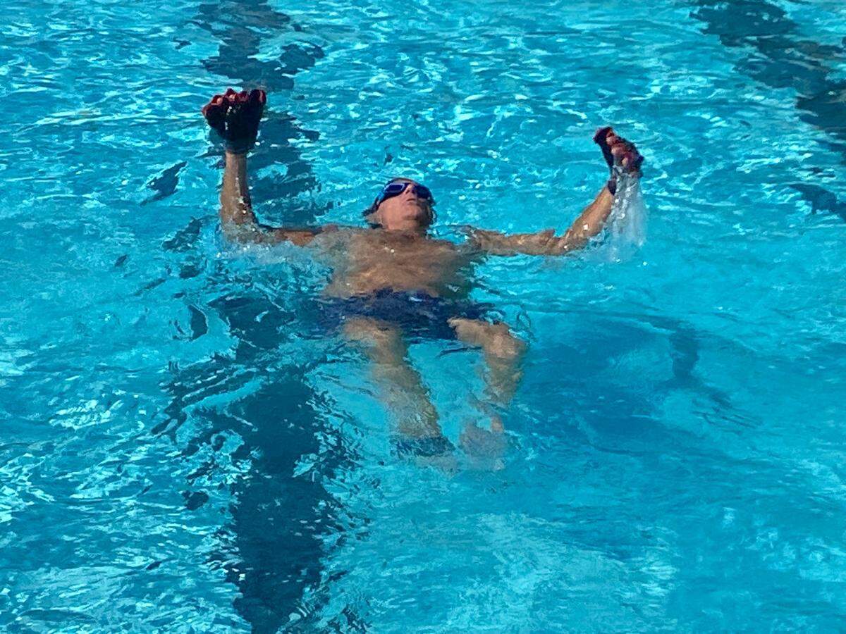 Ed Petner can swim the length of a 65-foot pool underwater despite being a paraplegic, a condition he hopes his fund raiser will help cure.