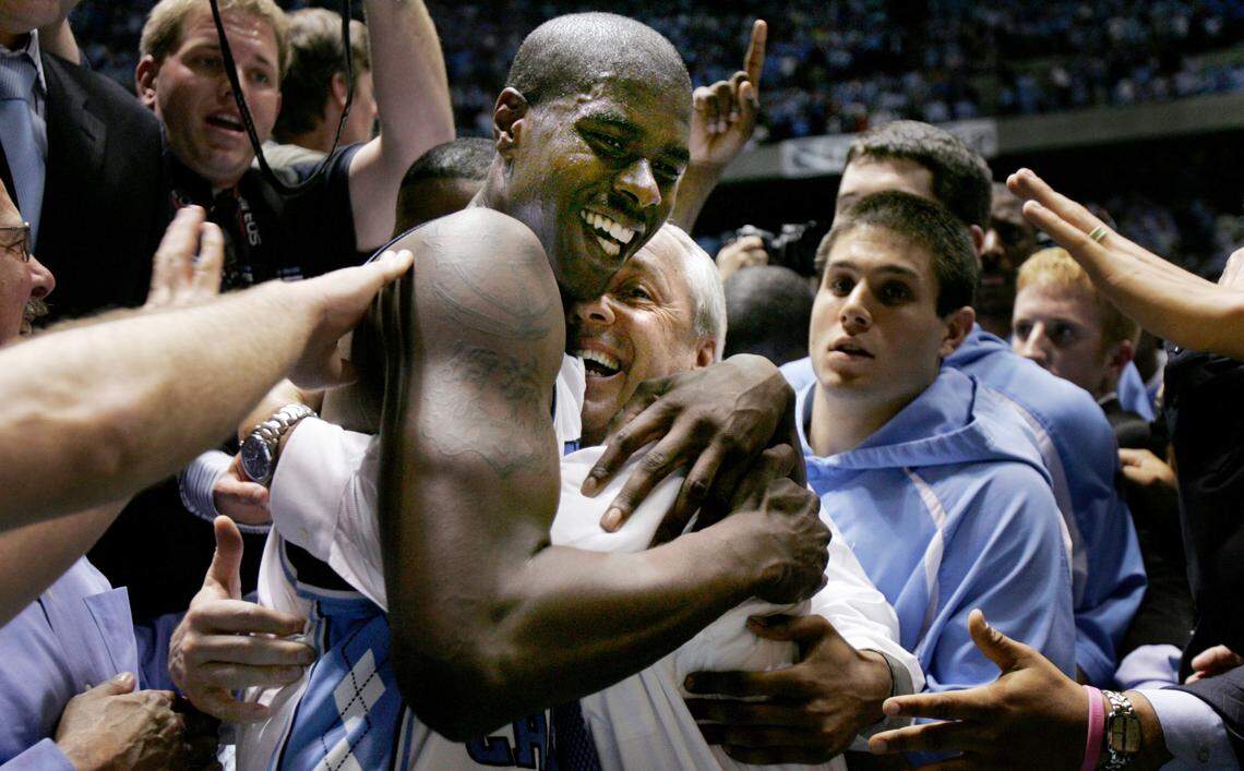 UNCDUKE1.SP.030605.SDL -- UNC’s Marvin Williams celebrates the Tar Heels 75-73 win over Duke with head coach Roy Williams. Marvin made the winning basket and drew a foul to seal the win. Staff Photo by Scott Lewis