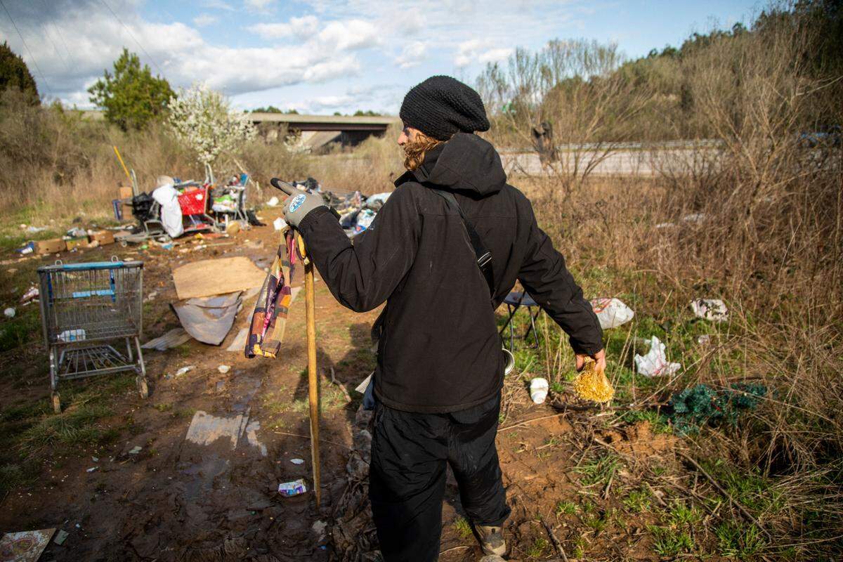 Mack Peace, 40, says he has lived in a camp between Interstate 540 and an exit ramp to Capital Boulevard for about a year. The NCDOT has received numerous complaints about trash and debris from the camp.
