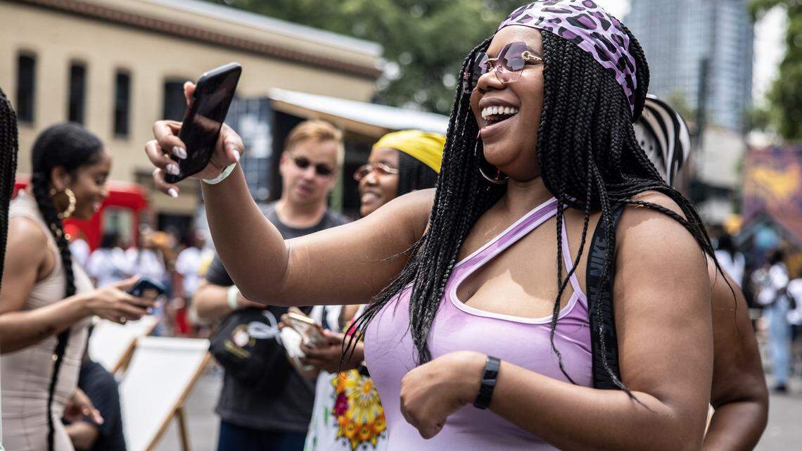 Perrine DeSheild dances during Durag Fest 2021 in Charlotte, on Saturday, June 19, 2021.