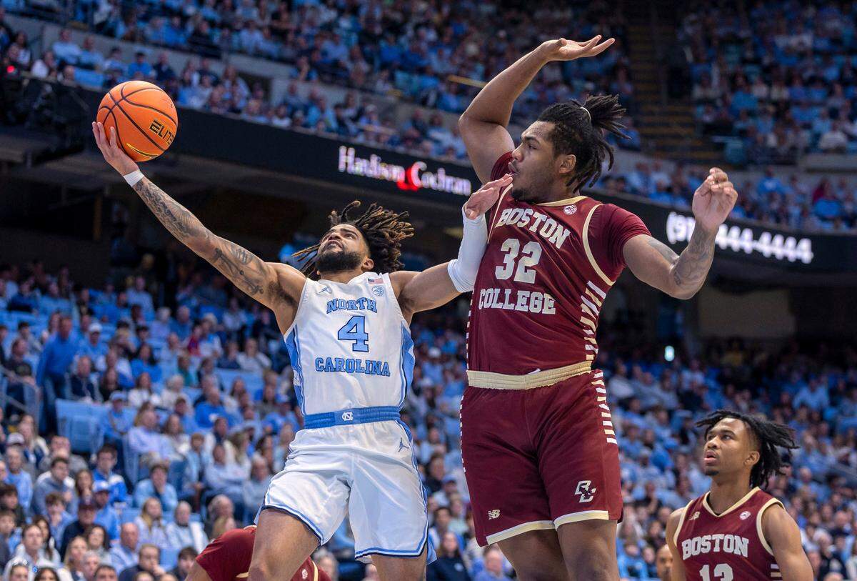 xNorth Carolina guard R.J. Davis (4) drives to the basket against Boston College forward Chad Venning (32) in the first half on Saturday, January 25, 2025 at the Smith Center in Chapel Hill, N.C.