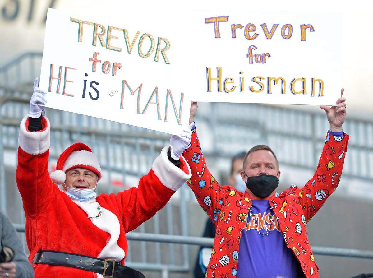 Clemson Tigers fans celebrate the teamÕs play during first quarter action against Notre Dame at Bank of America Stadium on Saturday, December 19, 2020 in Charlotte, NC. The Clemson Tigers and Notre Dame Fighting Irish faced off in the ACC Championship game.