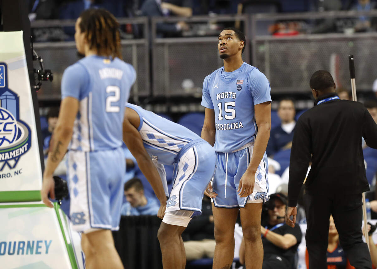 UNC’s Garrison Brooks (15) looks upduring the second half of the Syracuse Orange’s 81-53 victory over the North Carolina Tar Heels in the second round of the ACC Tournament at the Greensboro Coliseum Wednesday, March 11, 2020.