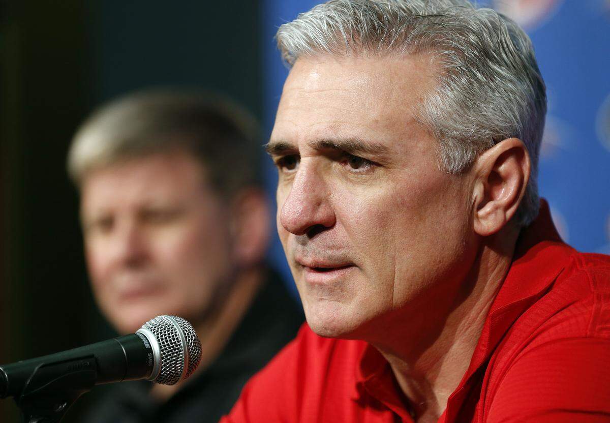 The Carolina Hurricanes’ then general manager Ron Francis, right, and head coach Bill Peters respond to reporter’s questions as they hold their end-of-season press conference at PNC Arena in Raleigh on April 12, 2017.