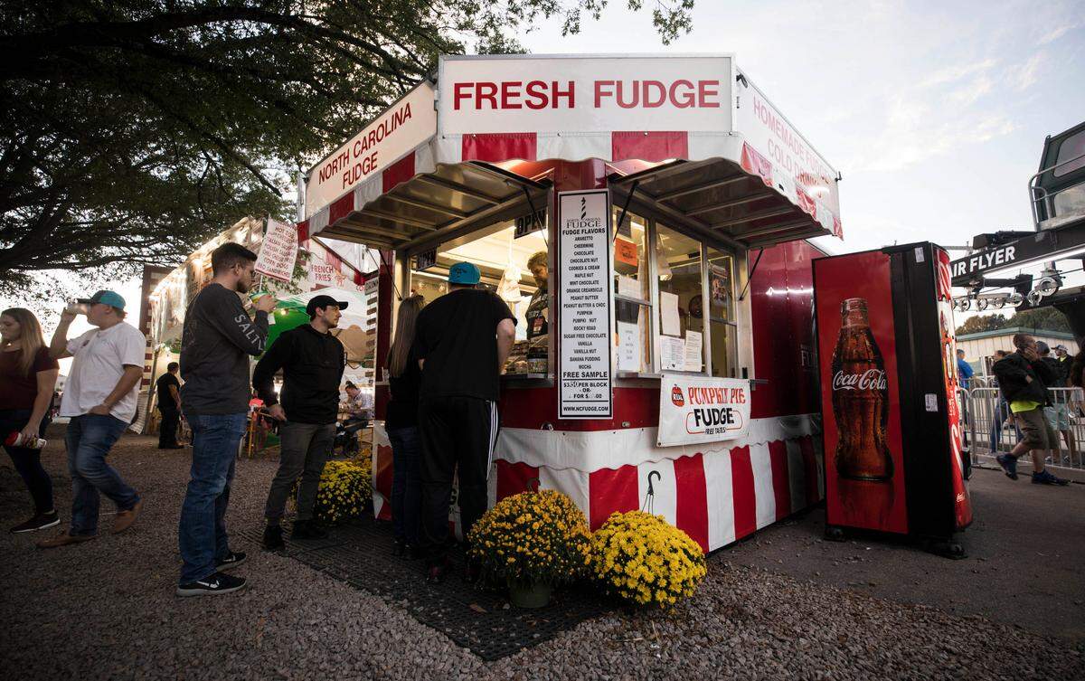 The North Carolina Fudge shop, located next to the State Fair Flyer, serves more than 20 flavors of fudge at the state fair every year.