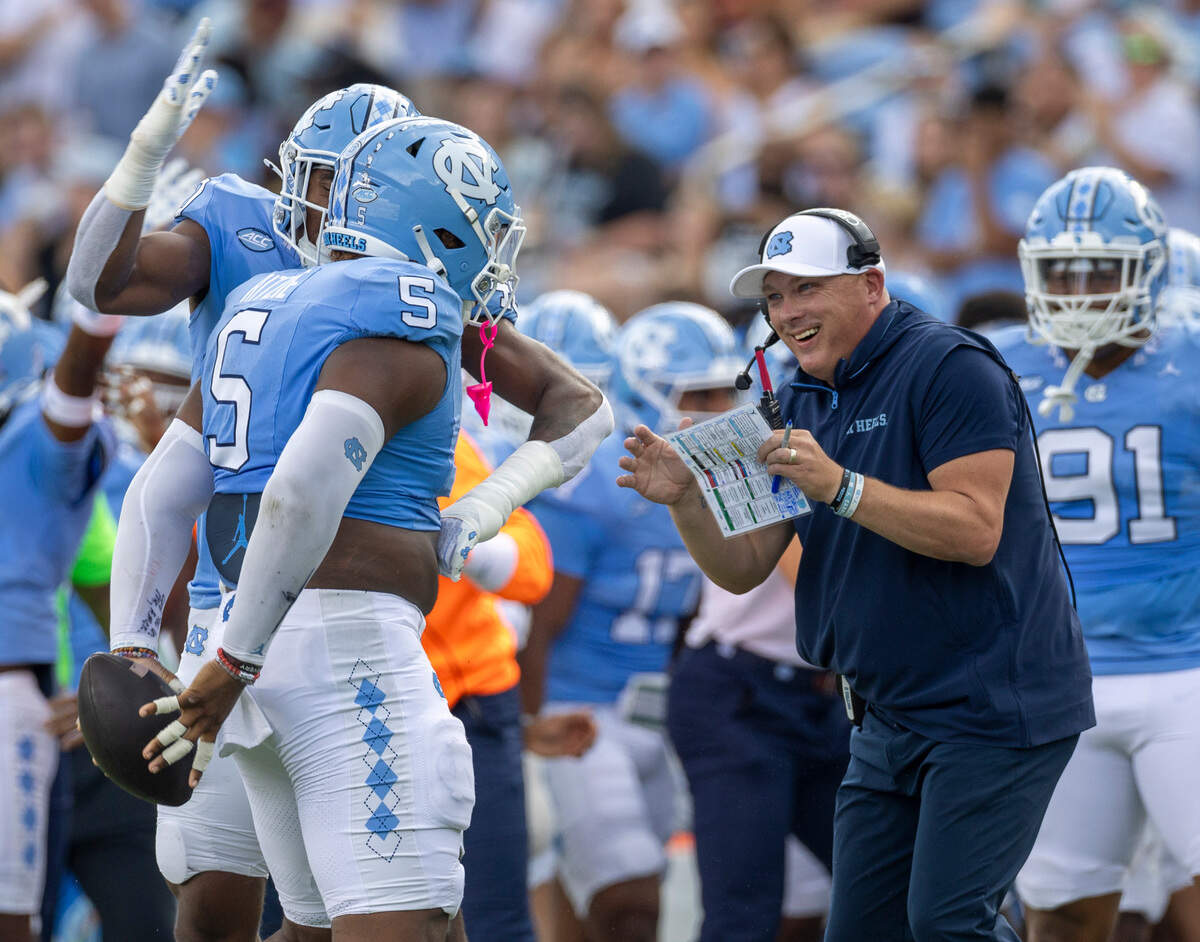 North Carolina defensive coordinator Geoff Collins reacts after a defensive stop by defensive lineman Jahvaree Ritzie (5) in the fist quarter against Charlotte on Saturday, September 7, 2024 at Kenan Stadium in Chapel Hill, N.C.