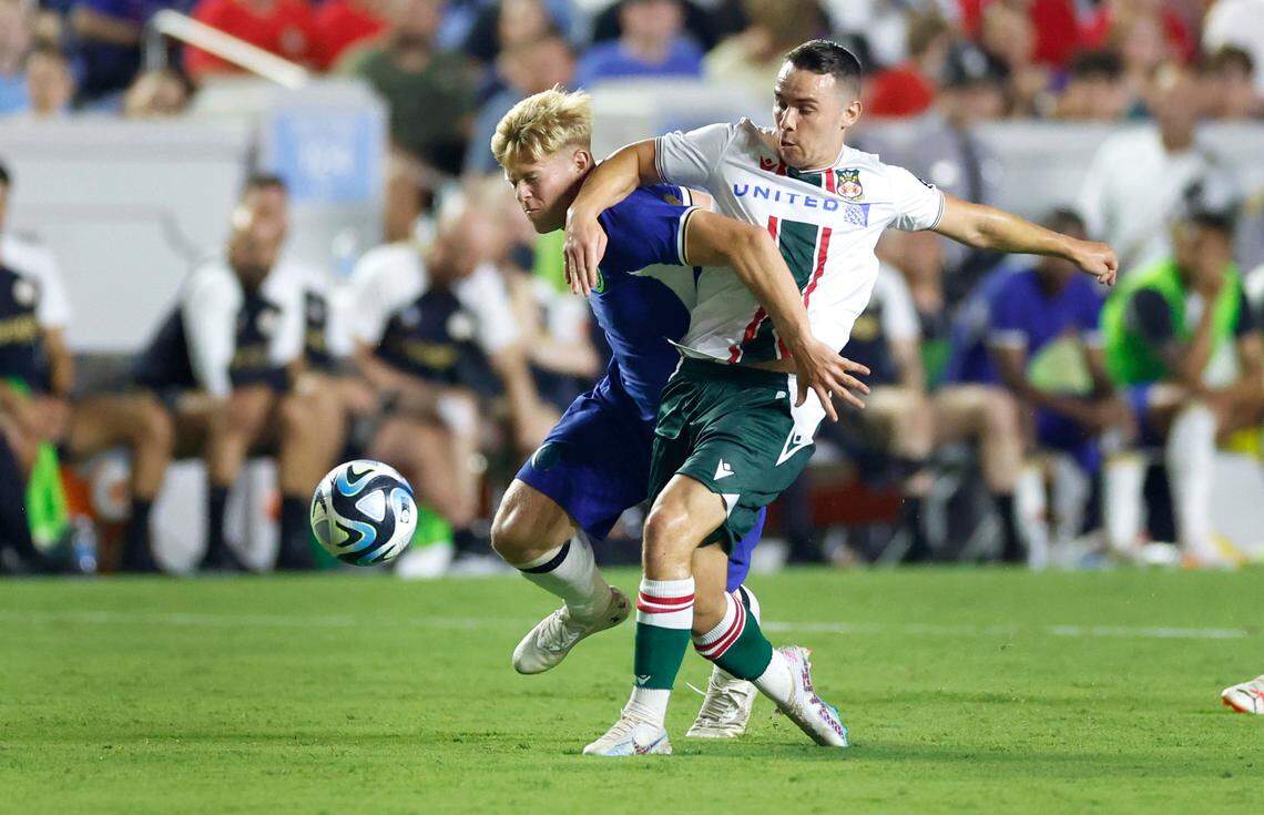 Chelsea’s Lewis Hall, left, battles Wrexham’s Billy Waters during the second half of Chelsea Football Club’s 5-0 victory over Wrexham AFC in a friendly match at Kenan Stadium in Chapel Hill, N.C., Wednesday, July 19, 2023.
