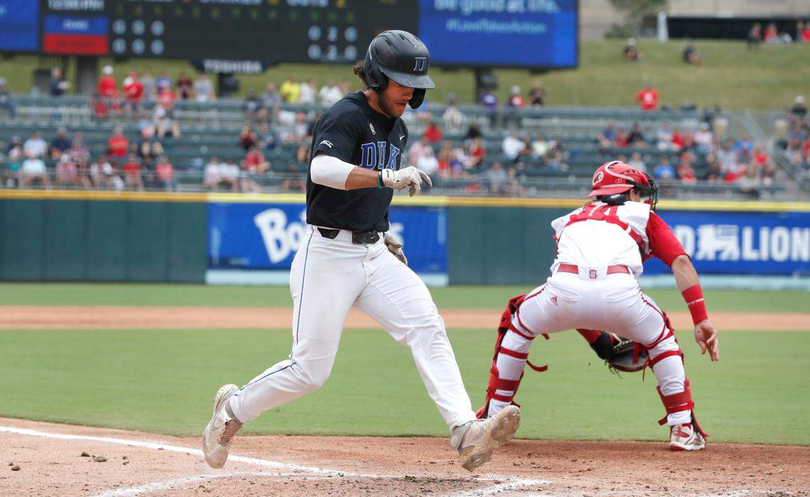 Duke’s Ethan Murray (1) scores in the fourth inning during N.C. State’s game against Duke in the ACC Baseball Championship at Truist Field in Charlotte, N.C., Sunday, May 30, 2021.