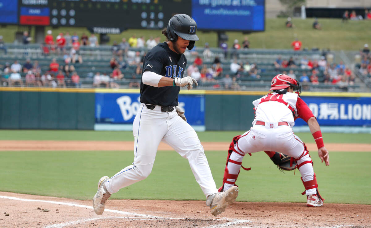 Duke’s Ethan Murray (1) scores in the fourth inning during N.C. State’s game against Duke in the ACC Baseball Championship at Truist Field in Charlotte, N.C., Sunday, May 30, 2021.