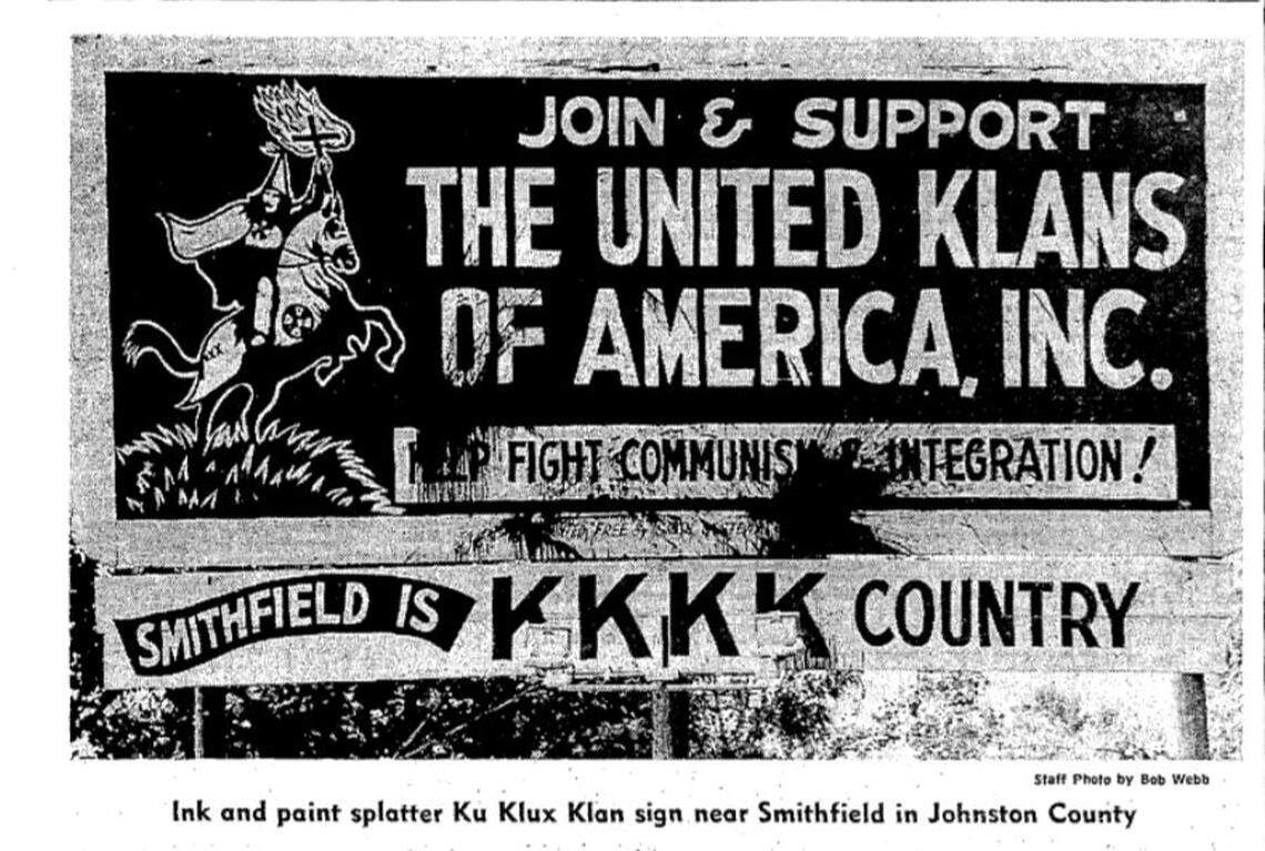 A photograph accompanying an article in The News & Observer on Aug. 17, 1970, about the “Klan Country” sign outside Smithfield in Johnston County.
