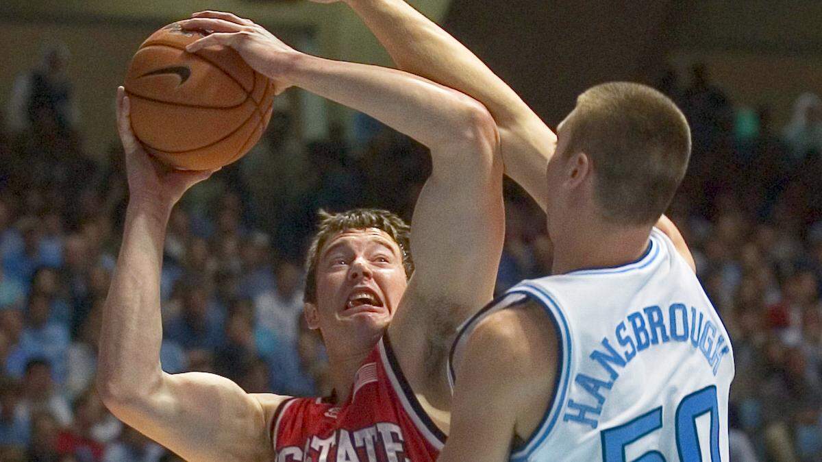 UNC's Tyler Hansbrough (50) plays tough defense against Andrew Brackman (40) during the first half of play on Saturday January 7, 2006 in the Smith Center. 