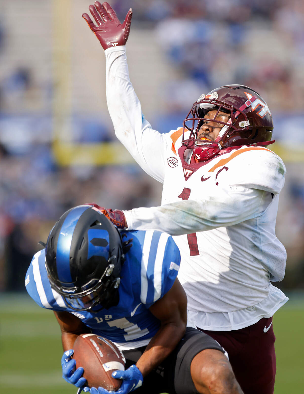 Duke Blue Devils wide receiver Jontavis Robertson catches a pass in front of Virginia Tech Hokies defensive back Chamarri Conner during the second half of a football game at Wallace Wade Stadium on Saturday, Nov. 12, 2022, in Durham, N.C.