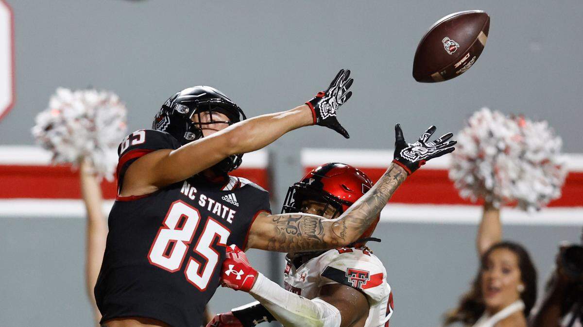 N.C. State wide receiver Anthony Smith (85) can’t pull in the pass while defended by Texas Tech defensive back Malik Dunlap (24) during the second half of N.C. State’s 27-14 victory over Texas Tech at Carter-Finley Stadium in Raleigh, N.C., Saturday, Sept. 17, 2022.