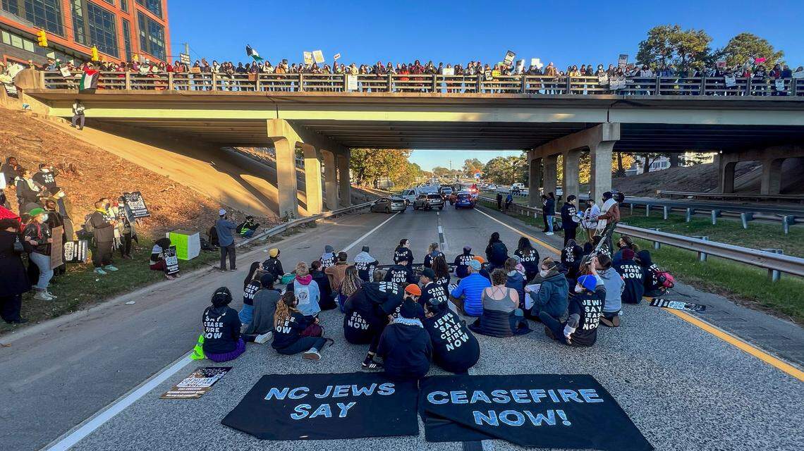 Protesters blocked the northbound lanes of the Durham Freeway at the South Mangum Street bridge for hours Nov. 2, 2023, while demanding a ceasefire in the Israel-Hamas war.