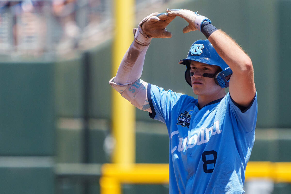North Carolina Tar Heels center fielder Owen Hull (8) celebrates after driving in a run on a double against the West Virginia Mountaineers during the fourth inning at Charles Schwab Field.