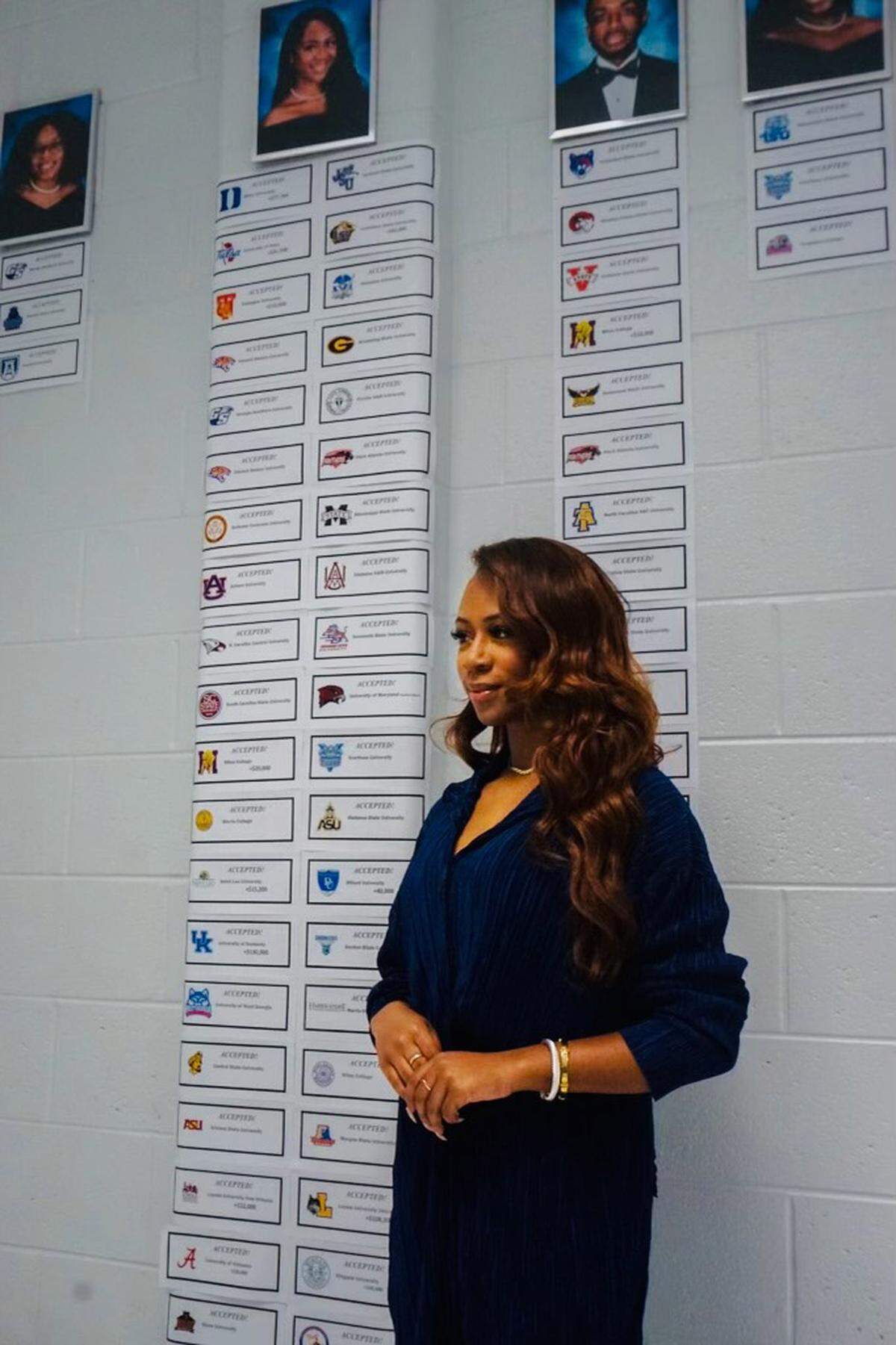 Daya Brown at Westlake High School with a list of some of the colleges that accepted her.