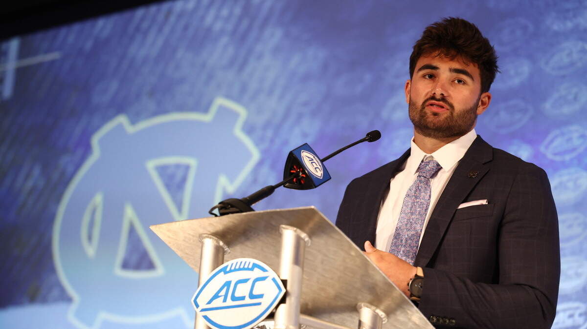 UNC quarterback Sam Howell addresses the media at ACC football media days on Wednesday in Charlotte. Howell is one of the favorites to win the Heisman Trophy this season.