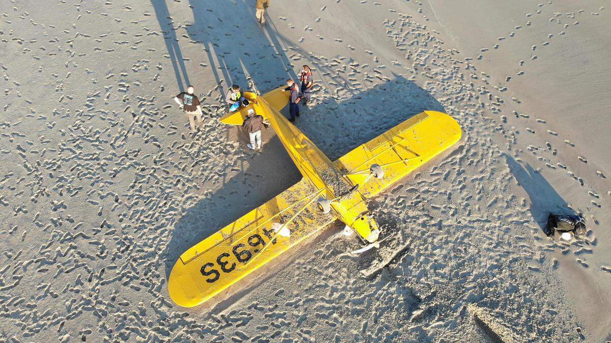 Multiple teams worked together to help rescue the pilot , officials said.
