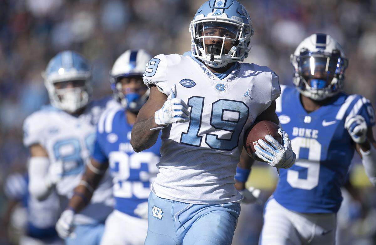 North Carolina’s Dazz Newsome (19) rushes 84 yards for a touchdown in the second quarter against Duke on Saturday, November 10, 2018 at Wallace Wade Stadium in Durham, N.C.
