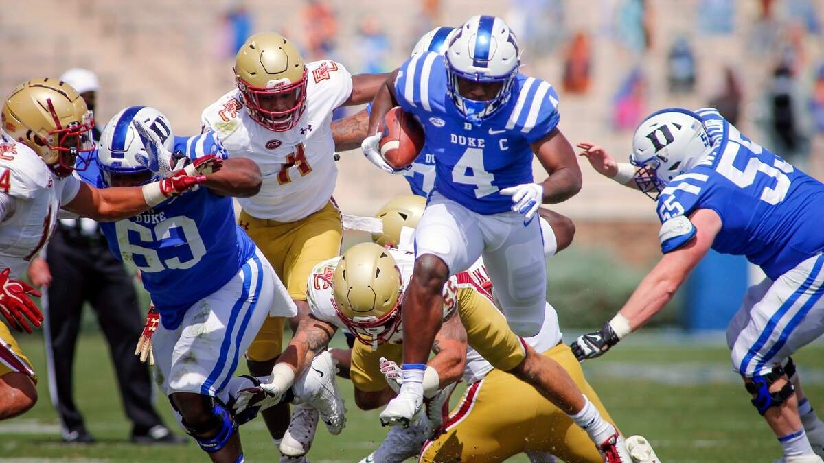 Duke Blue Devils running back Deon Jackson (4) rushes for a first down against the Boston College Eagles in the first half at Wallace Wade Stadium.