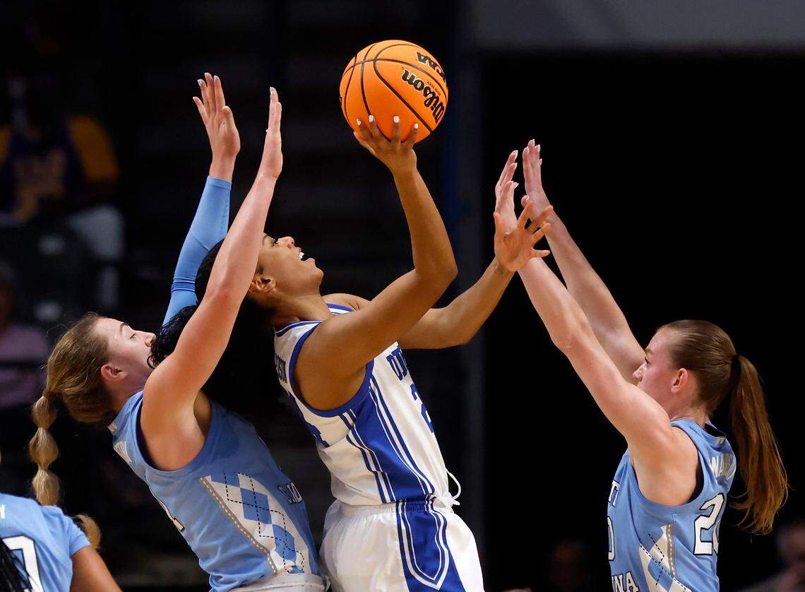 Duke’s Reigan Richardson shoots over North Carolina’s Alyssa Ustby and Lexi Donarski during the first half of the Blue Devils’ 47-38 win in the Birmingham Regional of the NCAA Tournament at Legacy Arena on Friday, March 28, 2025 in Birmingham, Ala.