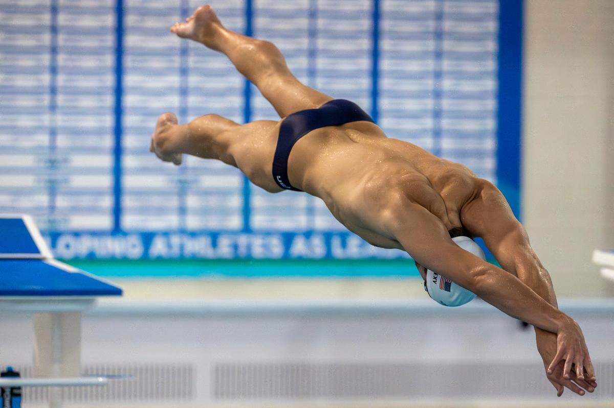 University of California swimmer Jack Alexy, a member of the 2024 United States Olympic Swim Team, dives into the pool on Saturday, July 6, 2024 at the Triangle Aquatic Center in Cary, N.C.