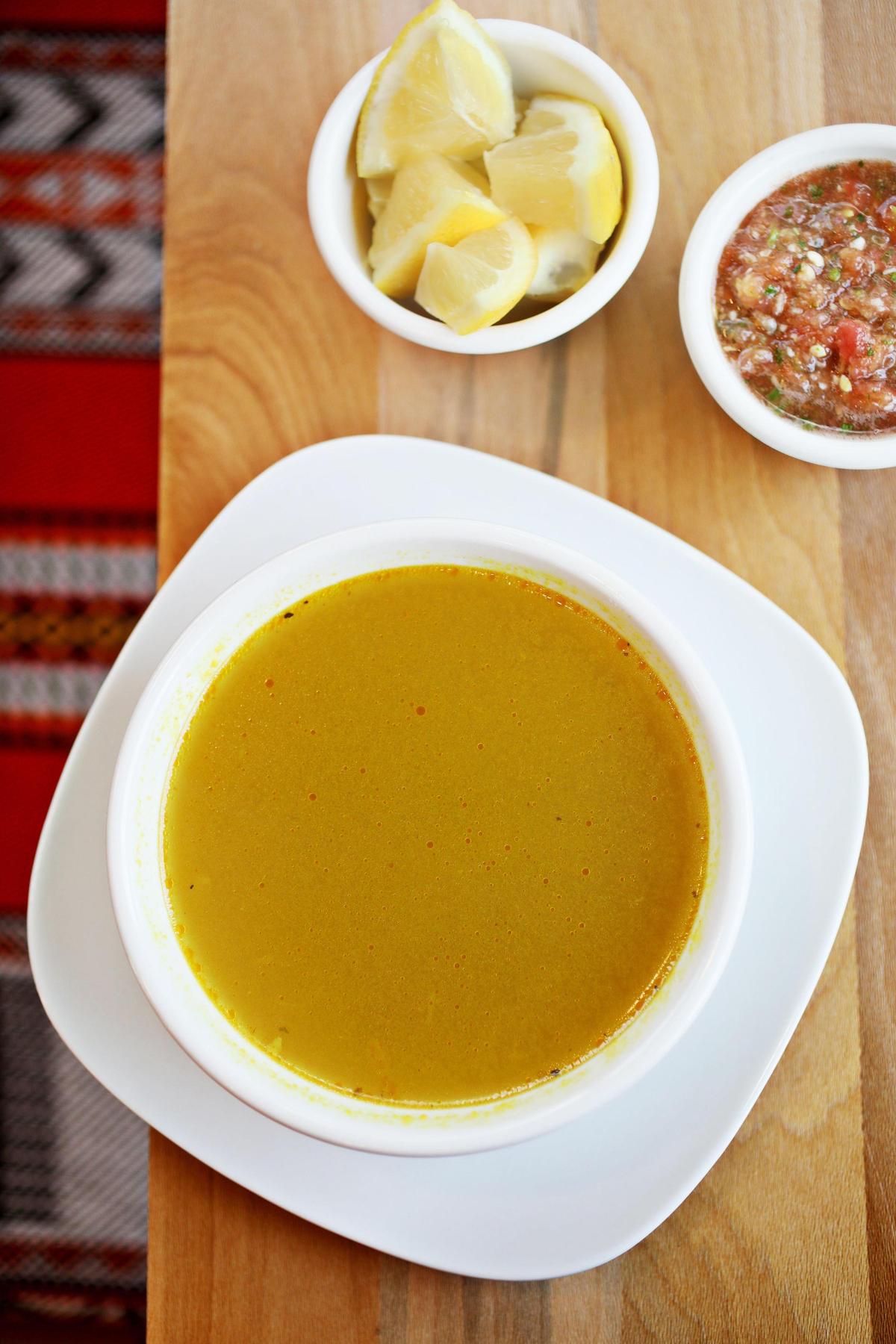 Yemen Kitchen’s maraq is a lamb broth often served at the start of the meal.