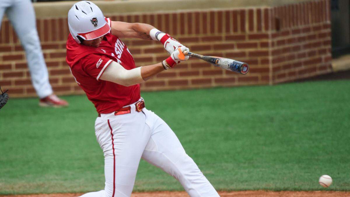 NC State Wolfpack’s Brandon Novy (50) connects with the ball against the Stetson Hatters during the NCAA Baseball Regional Tournament at Plainsman Park in Auburn, Ala., on Friday May 30, 2025.