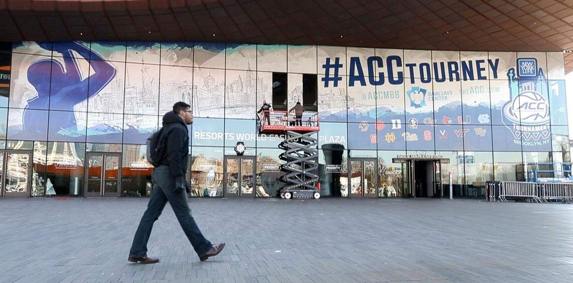 Workers finish the windows on the outside of the Barclays Center before the 2017 New York Life ACC Tournament in Brooklyn, N.Y., Monday, March 6, 2017.