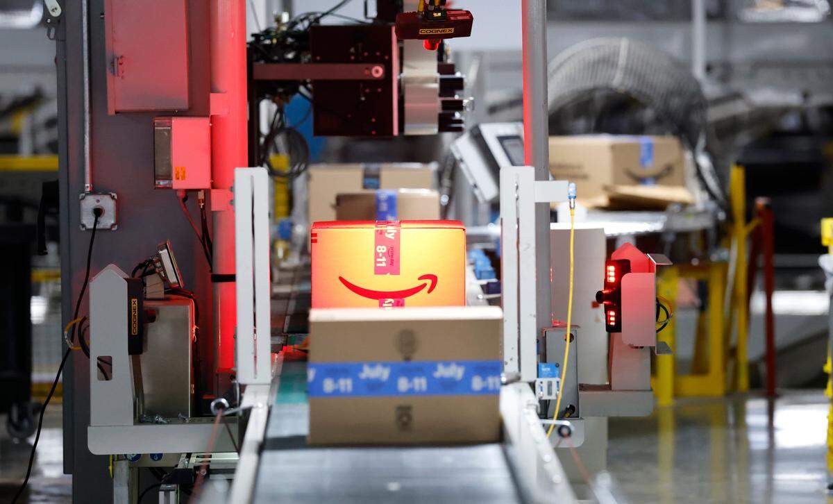 Packages are scanned at RDU1, an Amazon Robotics Fulfillment Center in Garner, N.C., Tuesday, July 1, 2025.